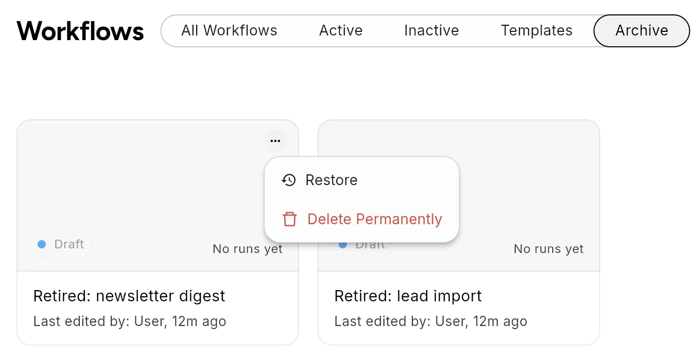 The Workflows page on the Archive tab with two archived workflows, one card's menu open showing Restore and Delete Permanently.