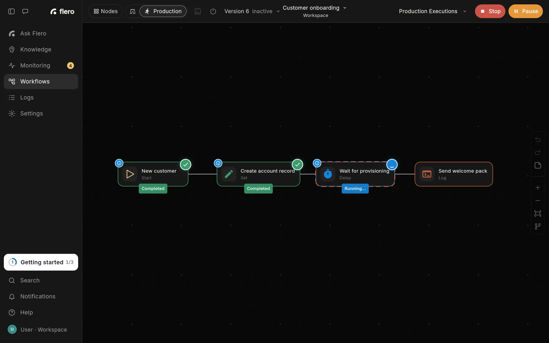 The editor during a live run: the red Stop and orange Pause buttons replace Run Workflow, two nodes are marked Completed and the Delay node shows Running.